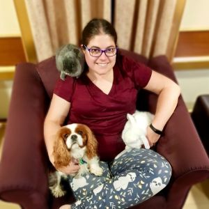 Kim with her King Charles Spaniel, Sam, and bunnies