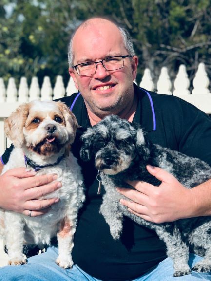 Ben holding Lola and Coco